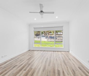 LARGE, FRESHLY PAINTED FOUR BEDROOM HOME IN PRIME LOCATION ! - Photo 1