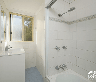 Three Bedroom Unit with Great Location - Photo 2