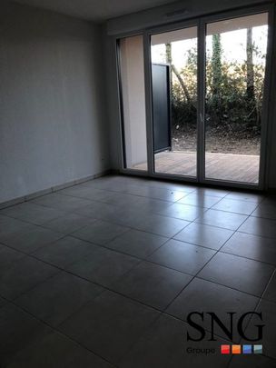 T2 AVEC JARDIN + 2 PARKINGS - Photo 1