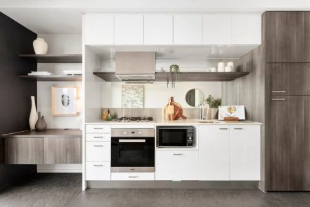 Stylish Second-Floor Retreat with Alfresco Balcony! - Photo 3