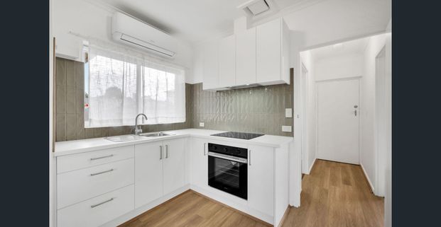 Easy-Care Unit Offering an Exceptional Lifestyle! - Photo 1