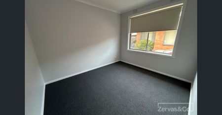 Freshly painted 2 bedroom unit - Photo 4