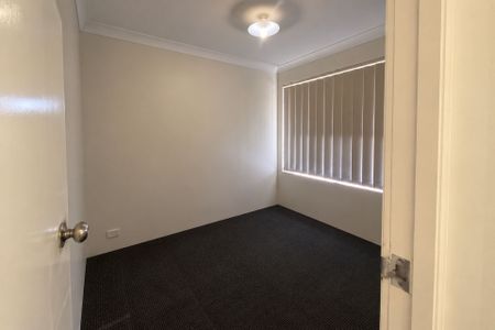 Neat 4-Bedroom Home with Monthly Lawn Mowing Included - Photo 4