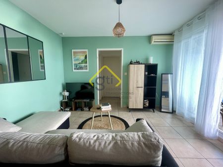 Location Appartement 2 pièces 49m² LA POSSESSION 97419 - Photo 4