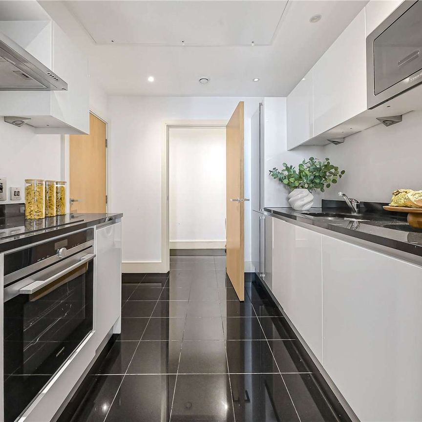 Exceptionally spacious two-bedroom apartment within this attractive and well-maintained portered development. - Photo 1
