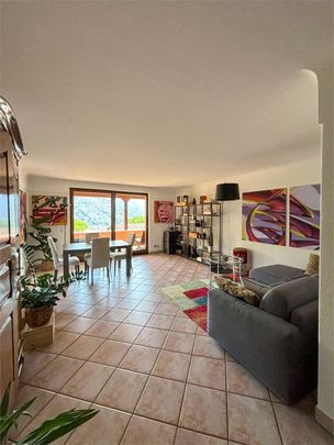 Lake view apartment in residence with swimming pool in Savosa - Photo 1