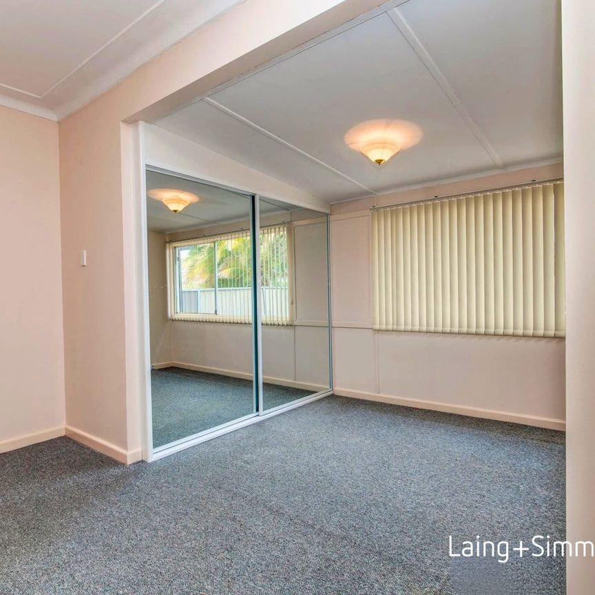 Comfortable three-bedroom home in convenient location - Photo 1