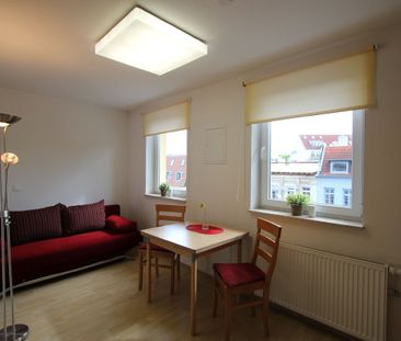 Modernes und möbliertes Apartment in zentraler Wohnlage mit kleinem... - Photo 1