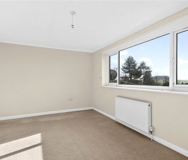 A detached three bedroom family home with a garage and driveway par... - Photo 4