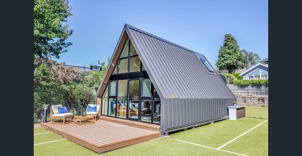 Stunning Loft-Style Unit with Large Playground and Sunroom - Photo 1
