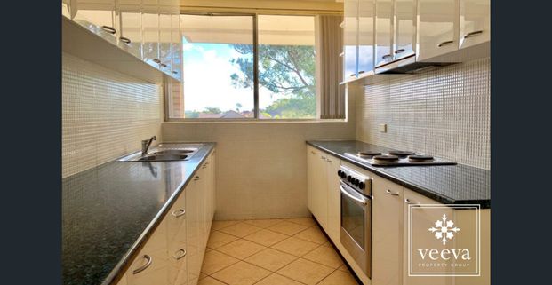 Waterfront Apartment with Pool and Garage - Photo 1