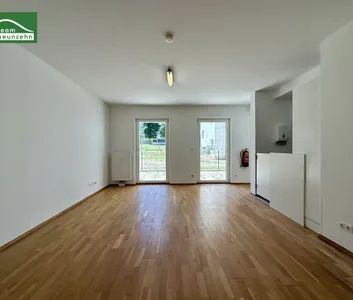 Großzügige Wohnung inkl. Einbauküche und großzügiger Terrasse in Ruhelage in 1100 Wien! - Photo 1