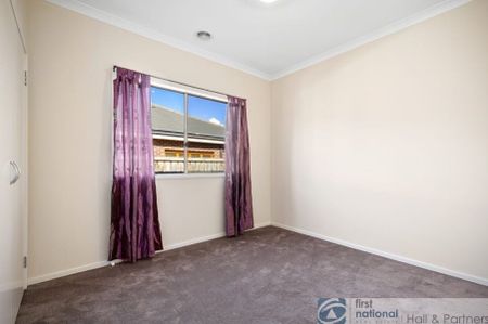 Well maintained modern three-bedroom home located in the highly sought-after Arena Estate. - Photo 2