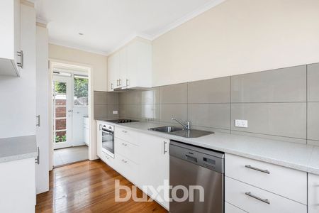 Renovated 2 BR unit in excellent location - Photo 4