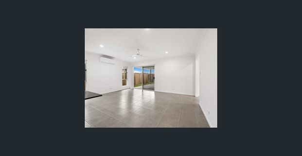 STUNNING NEAR NEW 4 BEDROOM HOME WITH DOUBLE AIR CON AND LARGE LIVING AREA! - Photo 1