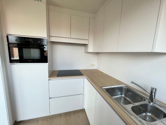 APPARTEMENT MET 2 SLAAPKAMERS, TERRAS EN GARAGEBOX VLAKBIJ CENTRUM - Foto 1