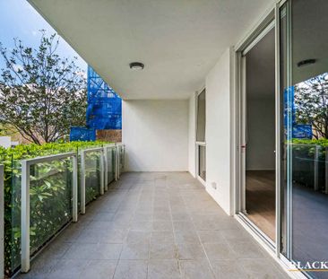Stylish One-Bedroom with Balcony & Lifestyle Location - Photo 1