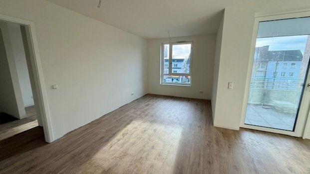 Neubau: Süd-Loggia: 2,5-Zimmer, Dielenboden, Einbauküche, großer HWR, Garage, Aufzug - Photo 1