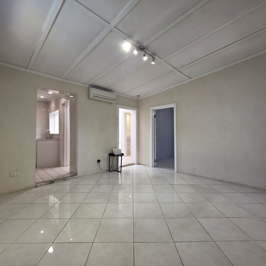 2 bedroom Cottage with external Retreat and Undercover Parking - Photo 1