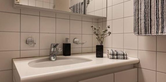 Premium-Wohnen! Mit Seenähe und eigenem Gartensitzplatz! - Foto 2