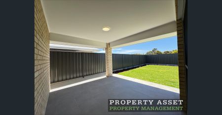 Beautiful Brand-New Family Home with Solar & Second Living Area - Photo 5