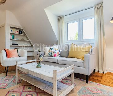 Ruhige, ansprechend eingerichtete 3-Zimmer Dachgeschosswohnung in H... - Foto 1