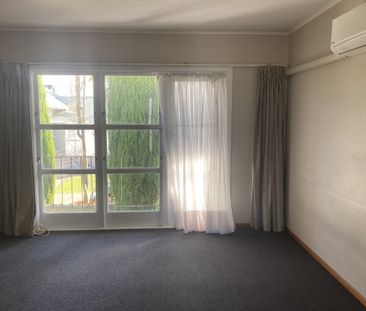 This tidy upstairs one-bedroom flat is located in the popular and c... - Photo 6