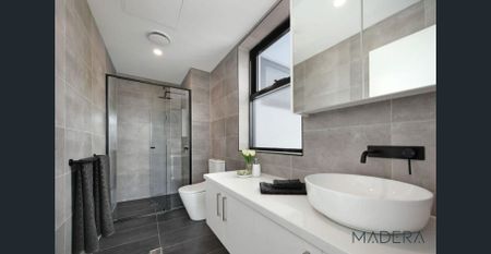 Modern Living in the McKinnon Secondary Zone - Photo 5