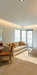 An incredible three bedroom property boasting an extremely modern finish throughout in a prime central London location. - Photo 4