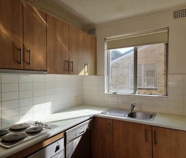 CONVENIENTLY LOCATED 2-BEDROOM UNIT FOR RENT - Photo 2