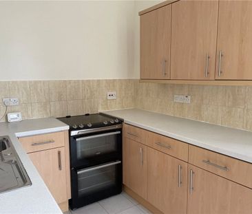 A charming two-bedroom ground floor flat situated within the old co... - Photo 4