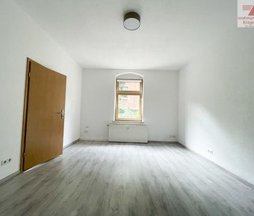 Schicke Single-Wohnung mit Einbauküche in zentraler Lage von Schwarzenberg! - Foto 1