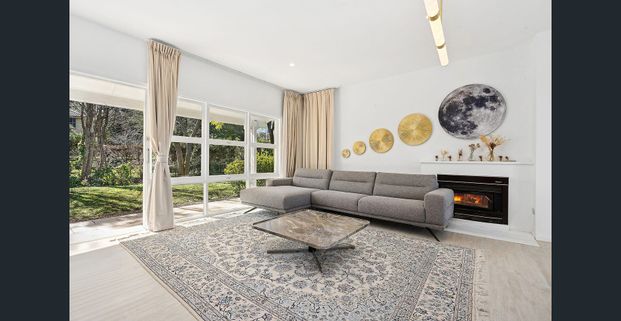 Immaculate Open-Plan Home on a Sprawling Parklike Block with Serene Bushland Views - Photo 1