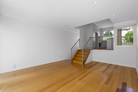 Live the Richmond Dream- Modern Comfort, a Sun-Filled Balcony, and the Best of Melbourne Right at Your Doorstep! - Photo 5