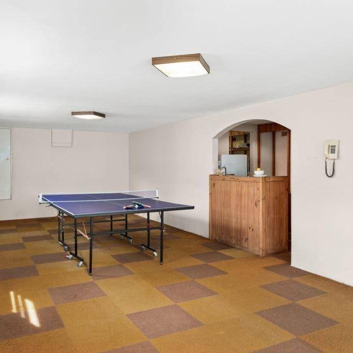Charming Light-Filled Cottage in Prime Location - Photo 1