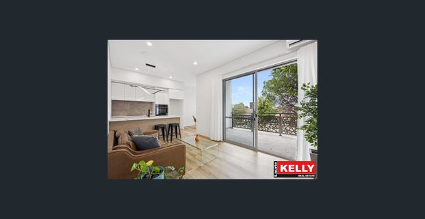 Modern One-Bedroom Unit in Highly Sought-After Woodlands - Photo 1