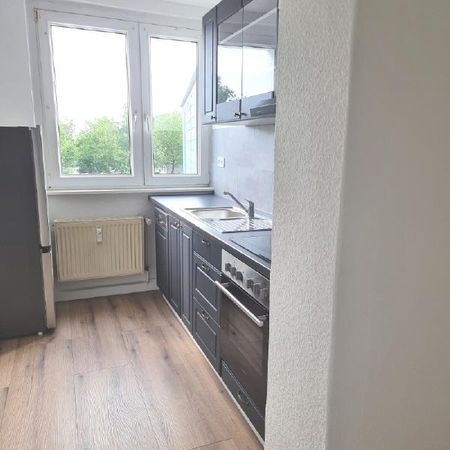 Sanierte Zweiraumwohnung mit Einbauküche - Foto 4