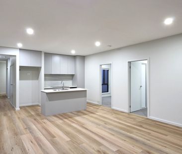 Luxury, Low-Maintenance Living in a Stylish New Townhouse - Photo 6