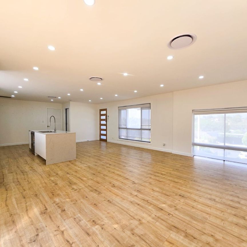 Stylish Family Living in a Peaceful Location - Photo 1