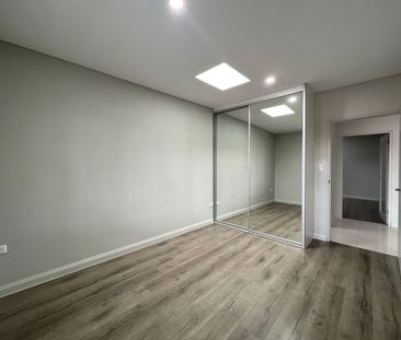 Spacious and Private 2 Bedroom Unit - Photo 2