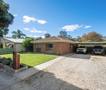 Neat Home with Large Shed - Photo 2