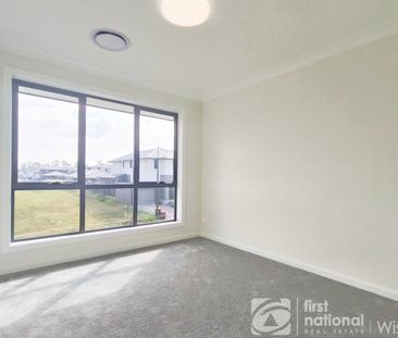 Park front 4-bedroom family home in the Heart of Colebee - Walk to ... - Photo 3