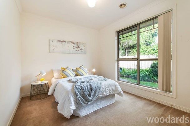 Spacious single level stunner with school zone appeal - Photo 1