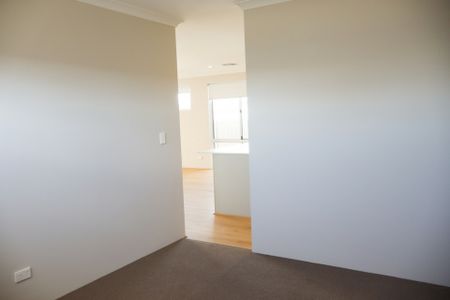 Live the Coastal Lifestyle in Brand New Four Bedroom Home! - Photo 3