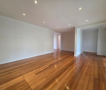 Freshly Painted, Perfectly Positioned Three Bedroom! - Photo 4