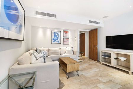 This apartment is located on the second floor of a portered building with lift service. - Photo 3