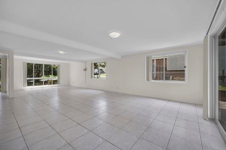 A charming home set on a generous block with a sprawling backyard. - Photo 4