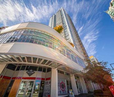 2 Bed Condo | Surrey University District | Parking • Den - Photo 3