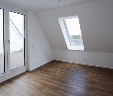 Dachgeschosswohnung mit großzügiger Terrasse - 3 Zimmer auf über 90... - Photo 3