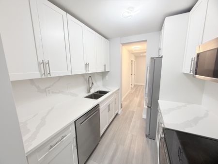 Updated and Bright Corner Unit Two Bedroom in Convenient Lougheed Area - Photo 4